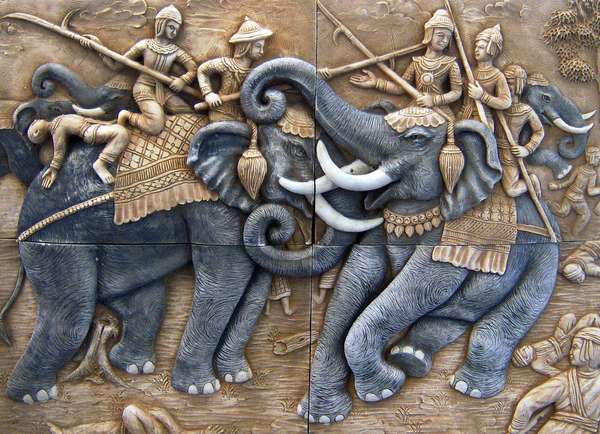 King Naresuan of Siam (Thailand) defeats and kills the Burmese (Myanmar) Crown Prince Mingyi Sra in elephant combat at the Battle of Nong Sa Rai, 1593. (Minchit Sra, Battle of Nong Sarai)