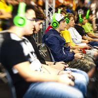 Young boys playing video games at a gaming festival in Rome, Italy in 2015. Video gaming