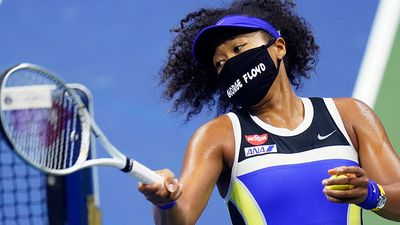 Naomi Osaka, of Japan, fires a ball into the stands after defeating Shelby Rogers, of the United States, during the quarterfinal round of the US Open tennis championships, Tuesday, Sept. 8, 2020, in New York.