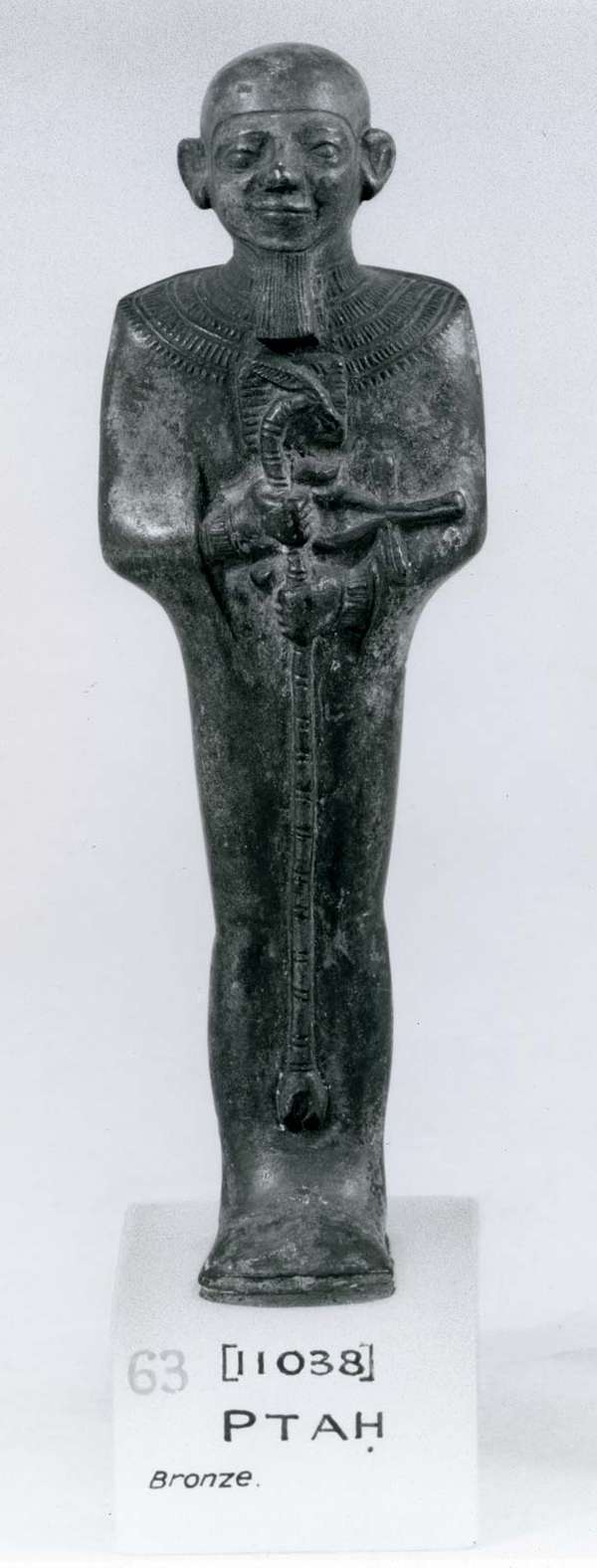 Ptah, holding the emblem of life and power, bronze statuette, Memphis, c. 600-100 BC; in the British Museum