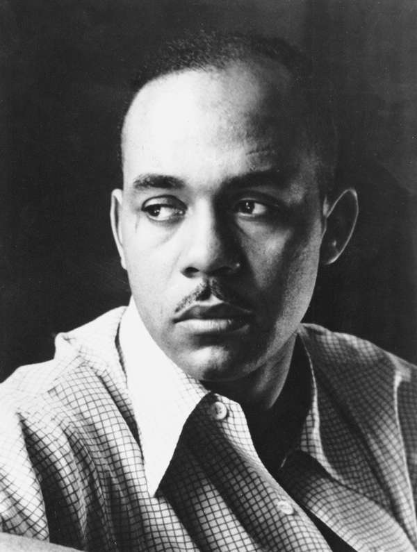 Head and shoulders portrait of American author Ralph Ellison, 1952. Photograph taken in advance of publication of his novel, &quot;Invisible Man.&quot;